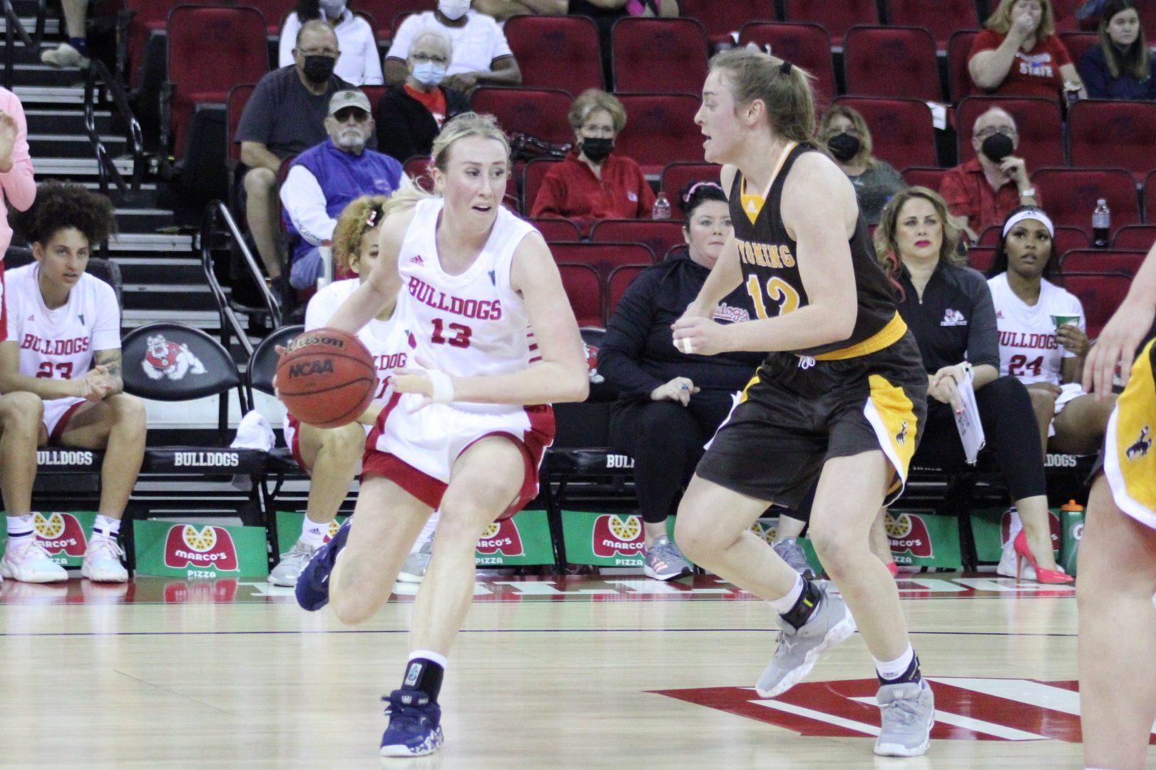 Fresno State forward Aimee Book looking for an open pass in their game against Wyoming Feb. 12, 2022 at the Save Mart Center. (Anahi Jaramillo/ The Collegian) 