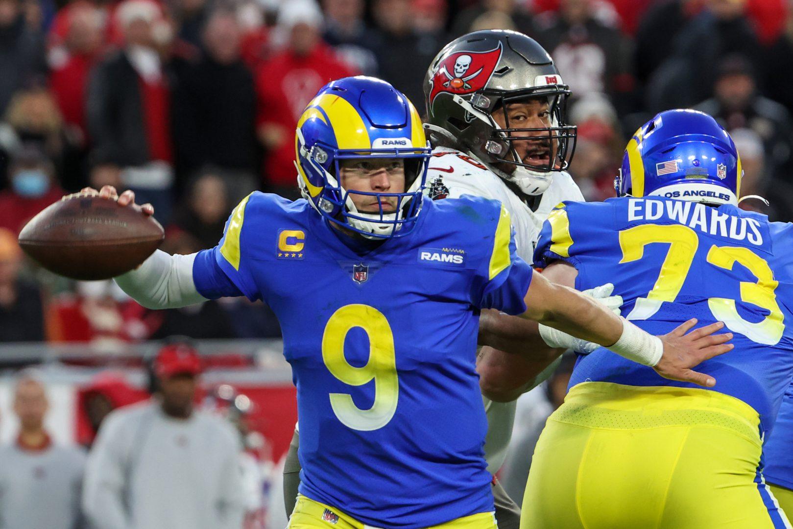Los Angeles Rams quarterback Matthew Stafford (9) moves to avoid pressure from Tampa Bay Buccaneers nose tackle Vita Vea (50) during a second-half drive in an NFC Divisional Playoff game at Raymond James Stadium on Jan. 23, 2022, in Tampa, Florida. (Robert Gauthier/Los Angeles Times/TNS)