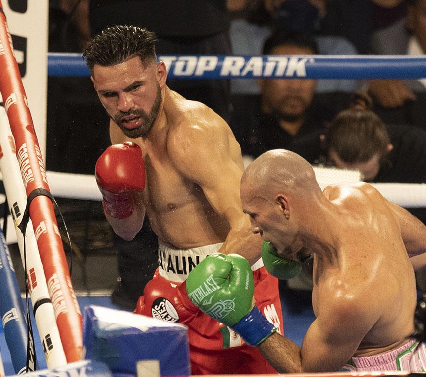 Jose Ramirez lands a punch on Jose Pedraza in round 4 of their match at The Save Mart Center on March 4, 2022. (Wyatt Bible/ The Collegian)