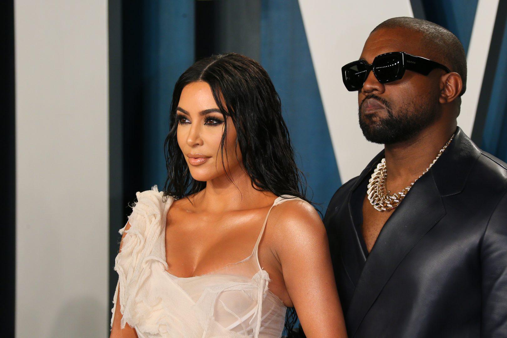 Kim Kardashian, left, and husband Kanye West attend the 2020 Vanity Fair Oscar Party following the 92nd Oscars at The Wallis Annenberg Center for the Performing Arts in Beverly Hills, California, on Feb. 9, 2020. (Jean-Baptiste Lacroix/AFP via Getty Images)