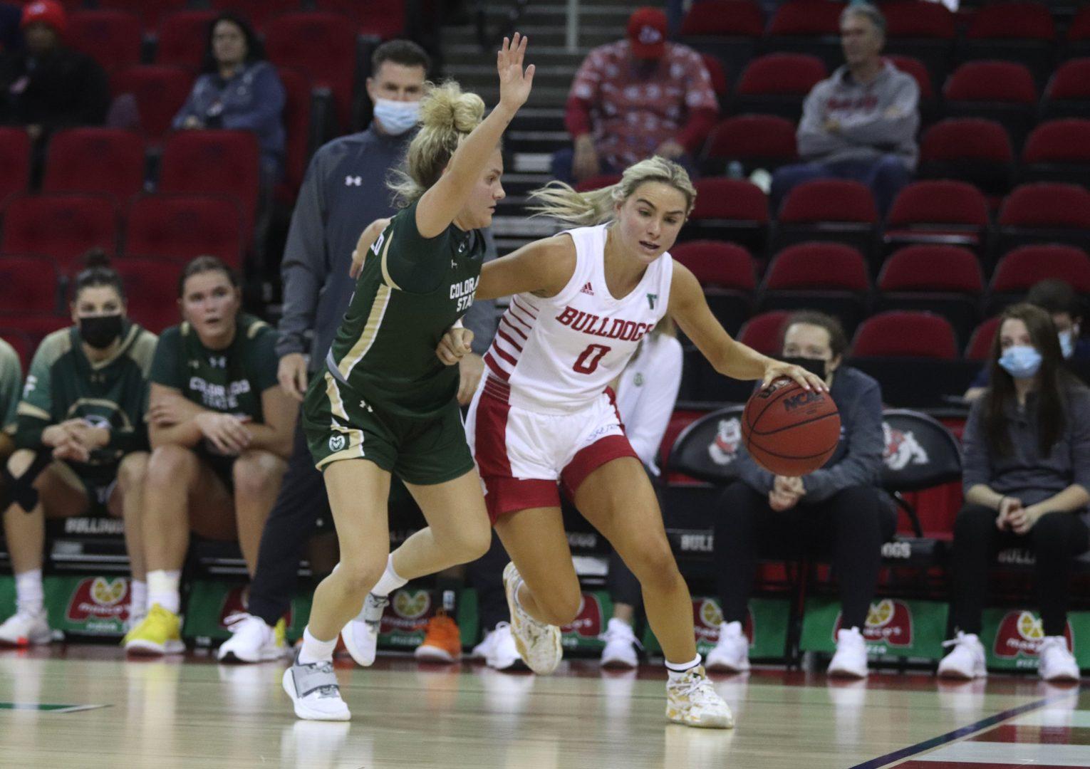 Fresno State guard Hanna Cavinder looks for an open pass to a teammate in their conference game against Colorado State, Jan. 24, 2022 at the Save Mart Center. (Melina Kazanjian/ The Collegian)