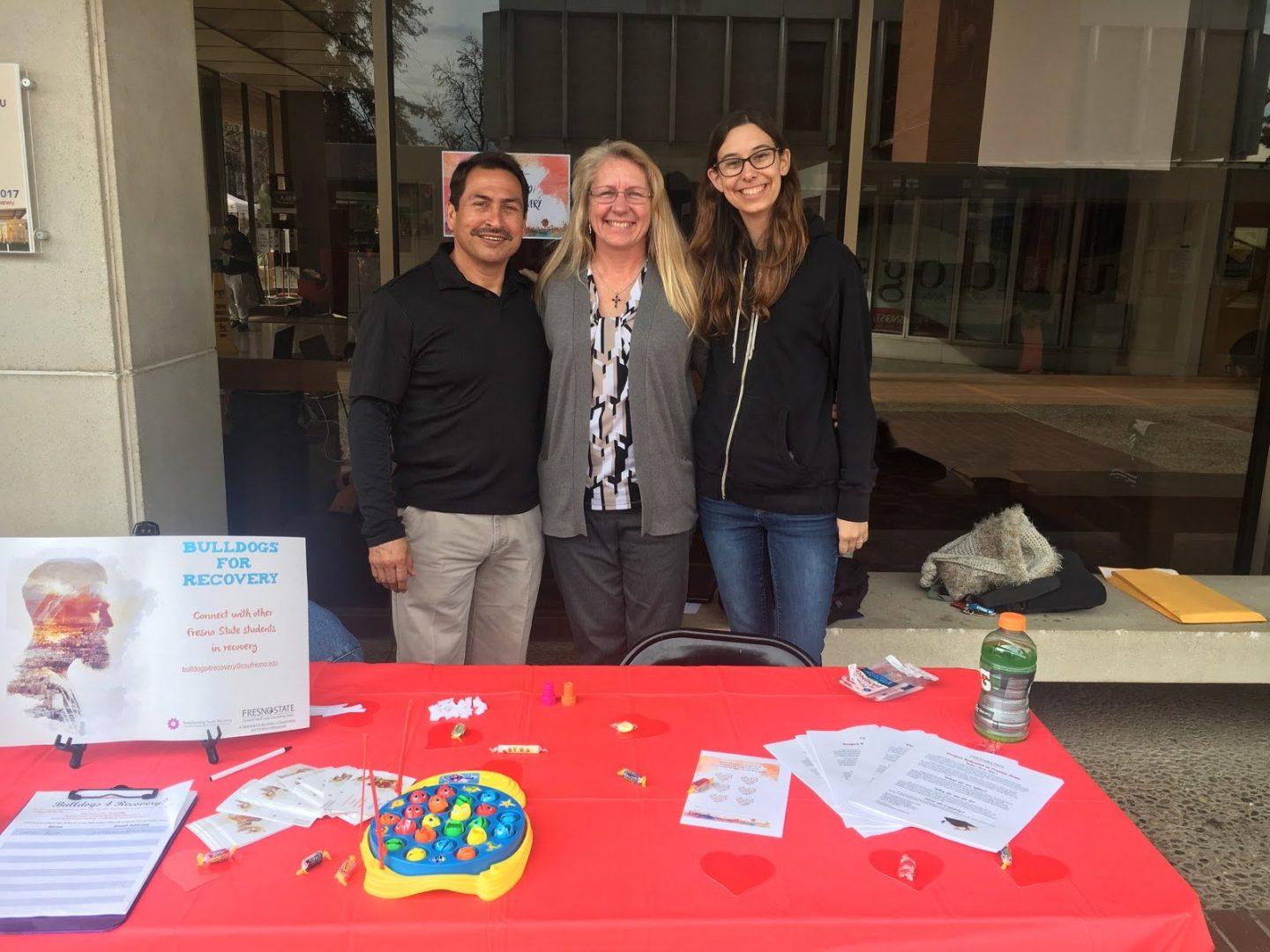 Arnold Trevino (left), Jennifer Leahy (center) and Hannah Riccardi (right) tabling for Project Rebound in partnership with the Student Health Center at the University Student Union in spring 2017. (Courtesy of Project Rebound)