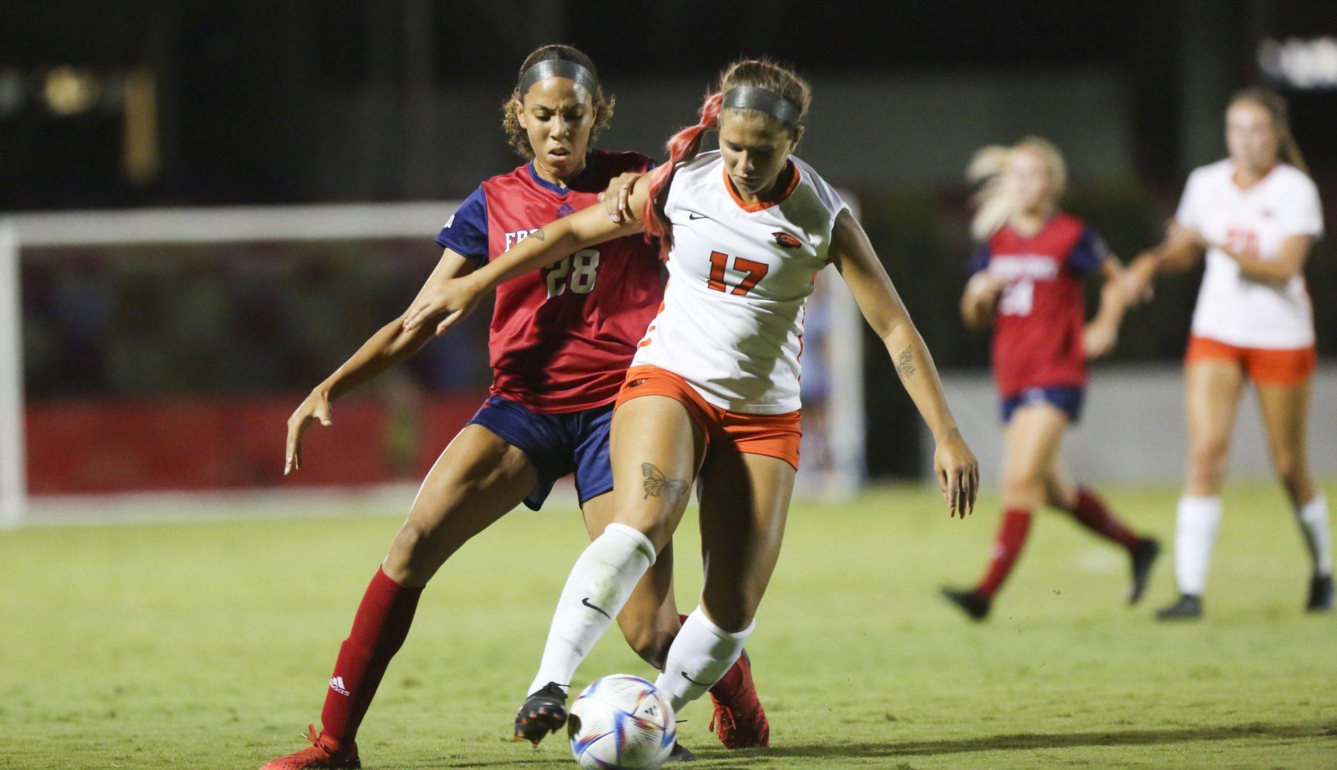 Fresno State Forward Ciara Wilson (28) boxes in Oregon State player at the home opener on Aug. 25, 2022, at Fresno State Soccer Stadium. (Eric Martinez/The Collegian)