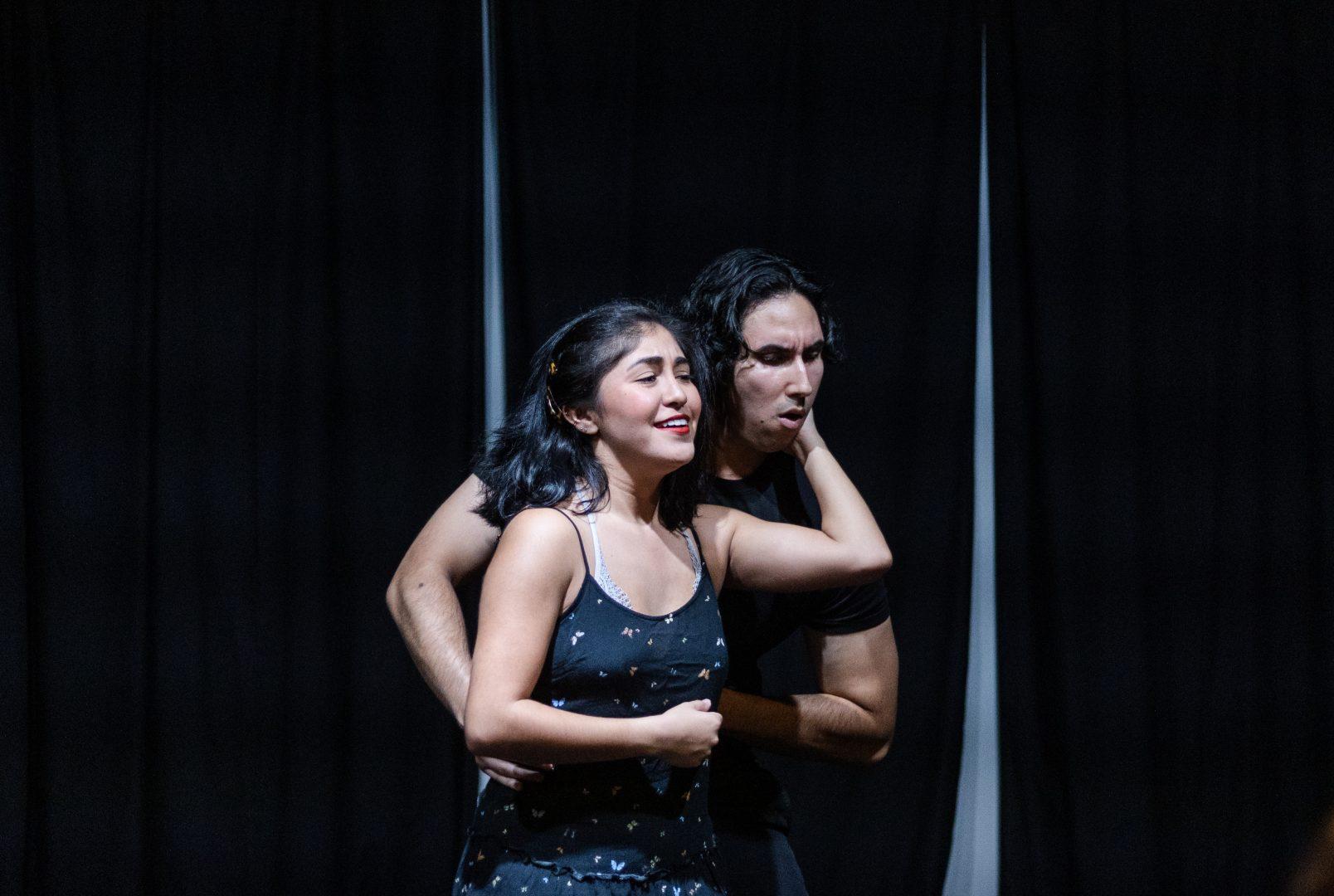 Alexis Elisa Macedo, left, performs with  Andrew Mikhael Caleb Trevino, right, in Chicana Legend. (Carlos Rene Castro/The Collegian)