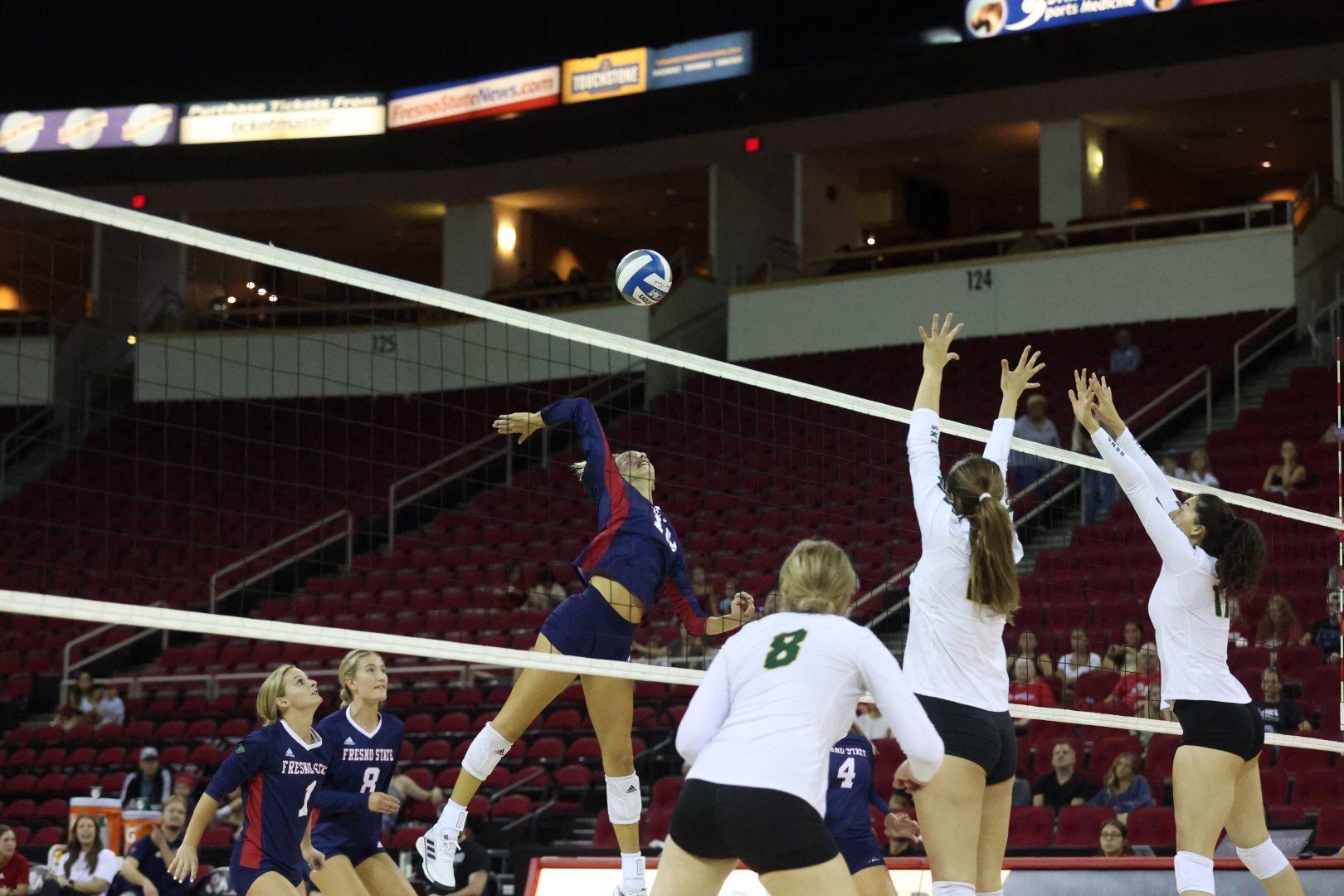 Fresno States Grace Doyle spikes the ball in the match against the University of San Francisco on Sept 3, 2022, at the Save Mart Center. (Marcos Acosta/ The Collegian)