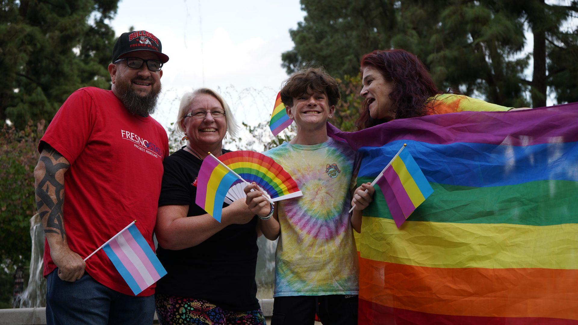 Fresno State faculty, staff and students gather at the fountain to celebrate new LGBTQ2+ Studies minor program in promo-
tional video. (Eric Martinez/The Collegian)