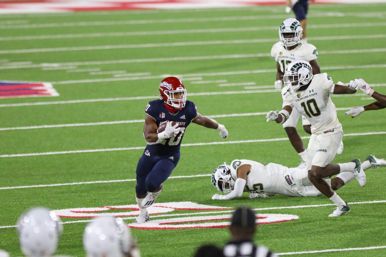 Fresno State’s running back Ronnie Rivers runs the ball against Colorado State Rams during the second quarter on October 30, 2020, at Bulldog Stadium. (Vendila Yang/ The Collegian) 