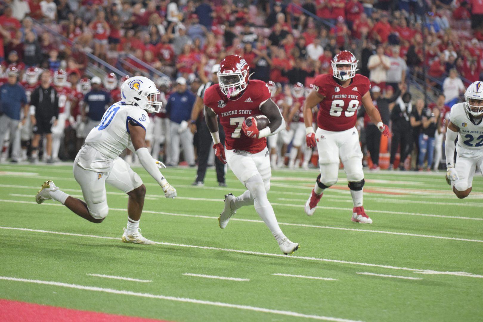 Jordan Mims (7) makes the first touchdown of the evening in the game against San Jose State at Valley Childrens Stadium. (Aidan Garaygordobil/ The Collegian) 