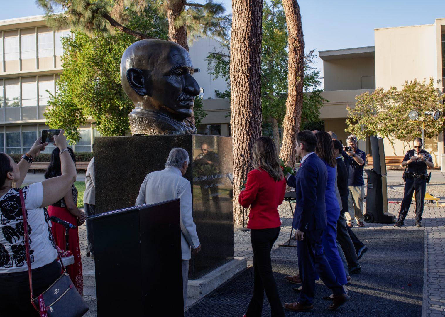 Officials from Fresno State and the city of Fresno celebrate Gandhi’s 153rd
birthday. (Diego Vargas/The Collegian)