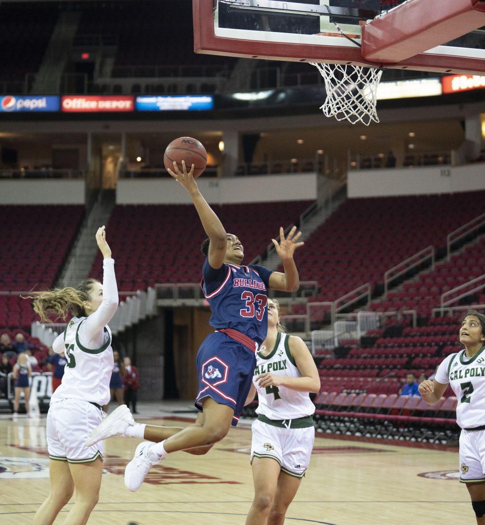 Amaya West goes for a basket in the game against Cal Poly on Nov. 18, 2022. (Blake Wolf/ The Collegian)