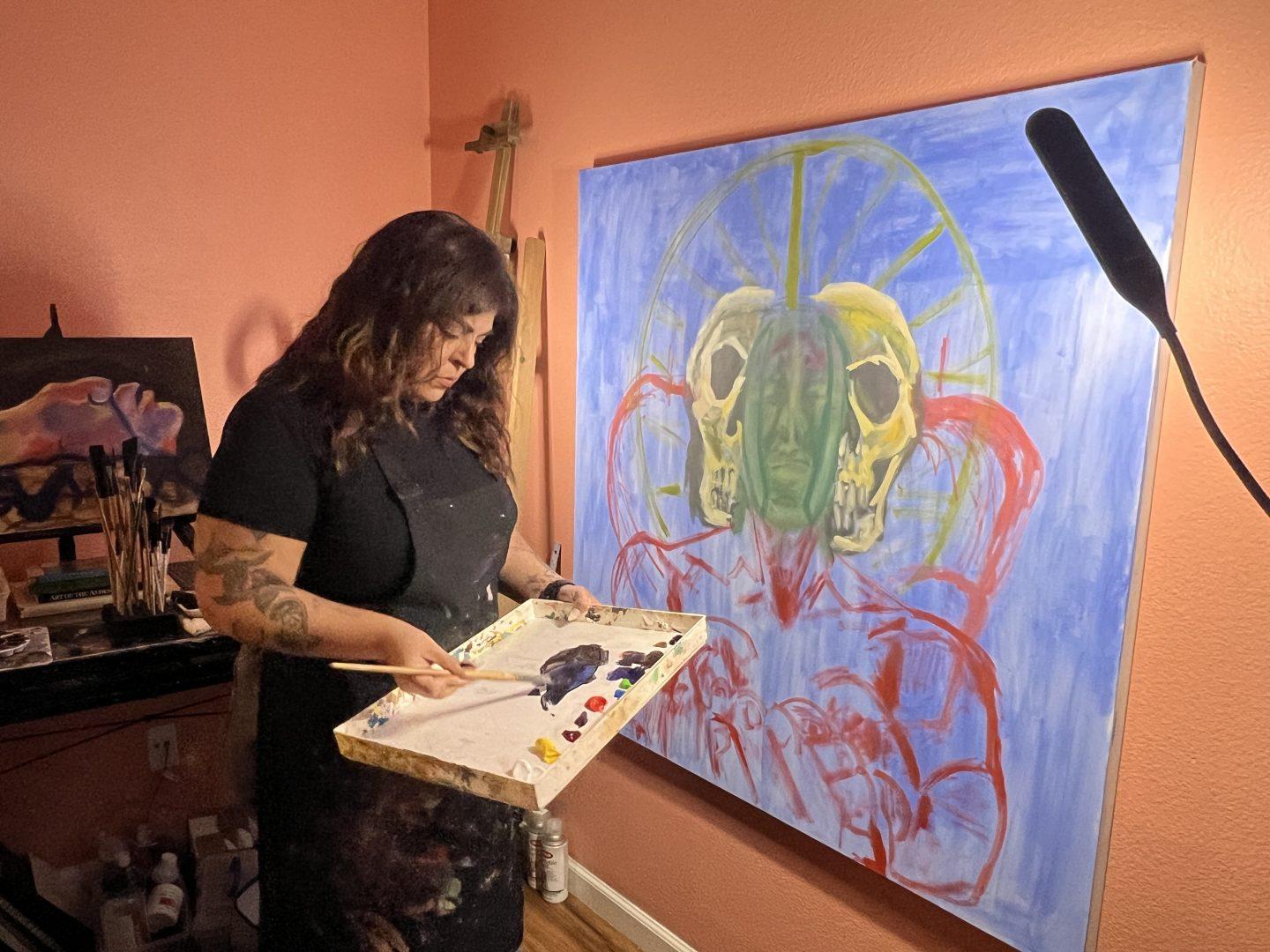 Fresno State student and artist Veronica Garcia focuses her personal experiences onto her canvases. (Viviana Hinojos/The Collegian)