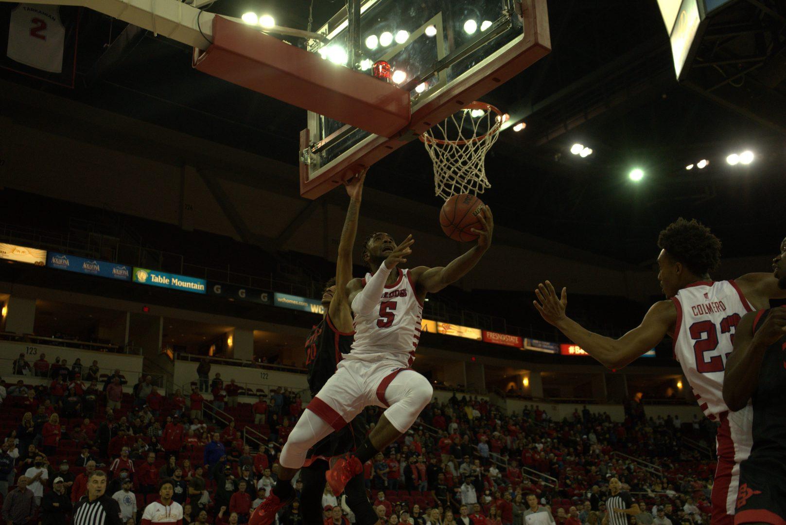 Fresno State guard Jordan Campbell performing a layup in the second half vs. SDSU on Feb. 19, 2022. (Wyatt Bible/ The Collegian)
