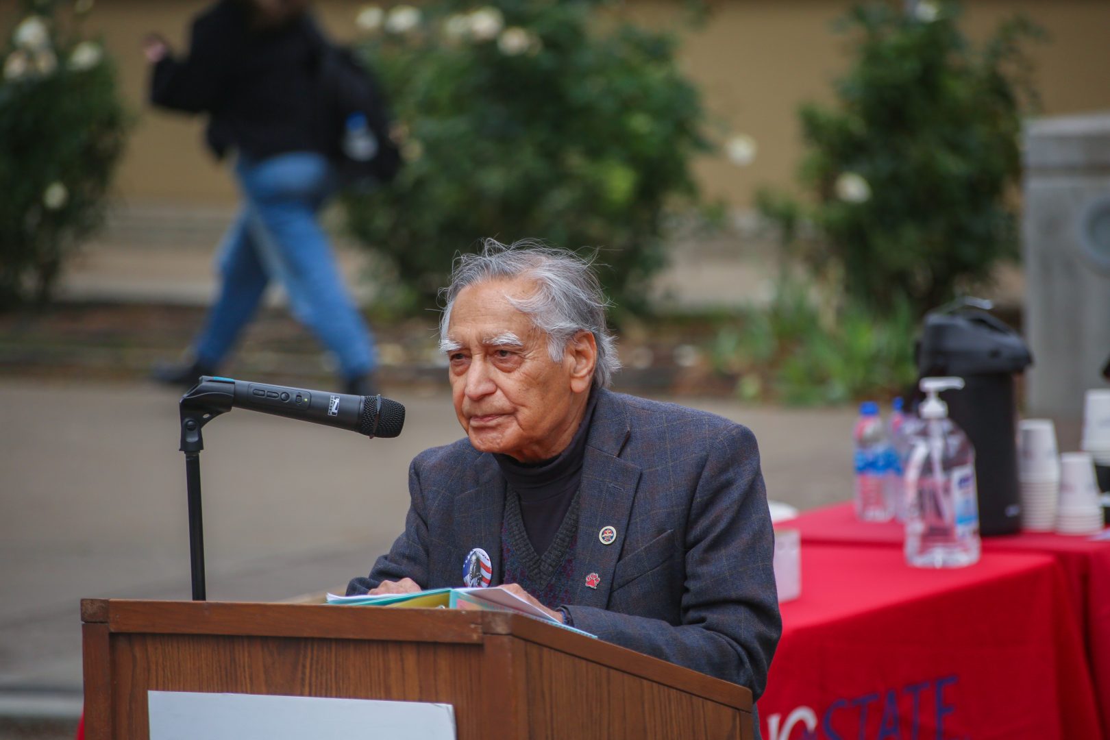 Fresno State Professor Emeritus of Social Work Sudarshan Kapoor announces a new Nelson Mandela statue installed in the Peace Garden as soon as next year. (Manuel Hernandez/The Collegian)