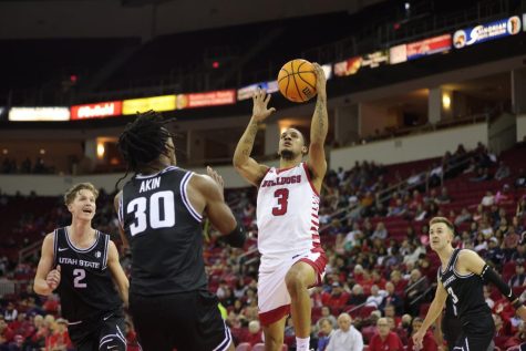 Isaiah Hill shoots a layup against Utah State on Jan. 28, at the Save Mart Center. (Marcos Acosta/The Collegian)