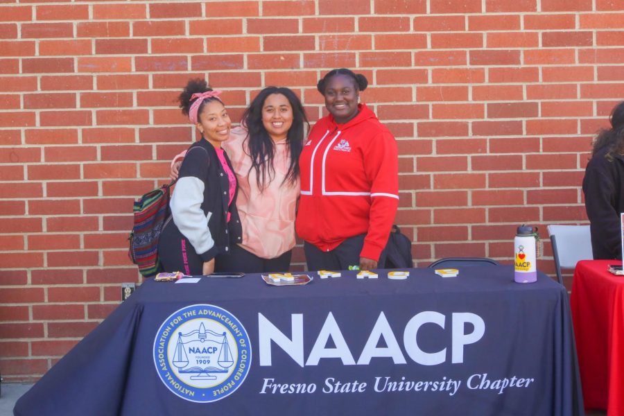 Marisa Williams (center), student coordinator for the CCGC, and Trinity Williams, the Fresno State NAACPs vice president, pose with another Fresno State student. 