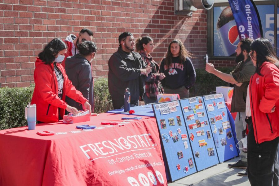Fresno States Off-Campus Student Life (OCSL) Program hosts booth during Club Rush on Feb. 14. 