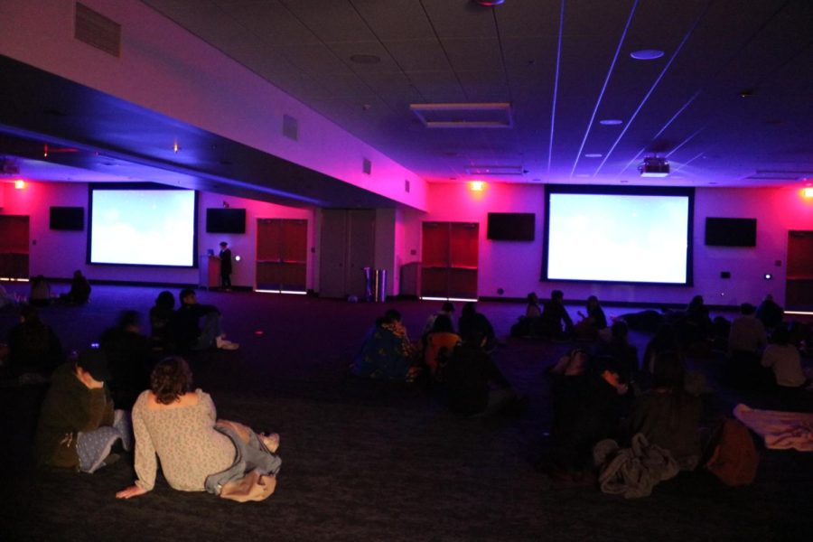 Students sit with their blankets and snacks at the Resnick Student Union. Fresno State’s Spotlight Events hosted a movie night on Feb. 6. (Aileen Guzman/The Collegian)