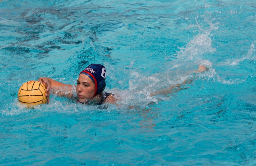Attacker Daphne Guevremont swims with the ball.