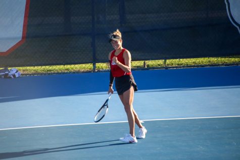 Mariya Vyshkina celebrates getting a point against BYU on March 15, at Spalding G. Wathen Tennis Center.   