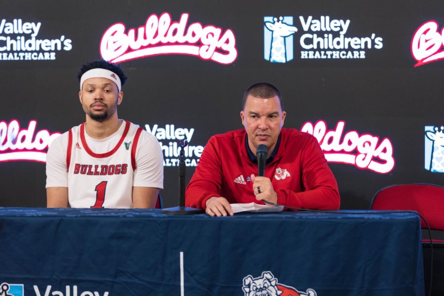 Jemarl Baker Jr. (left) and Fresno State Head Coach Justin Hutson answer questions during the post game press conference on Feb. 24. 