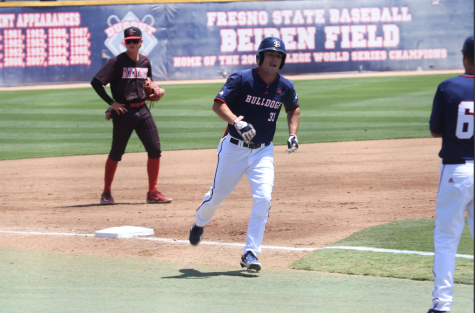 Tommy Hopfe heads toward home plate for a run against San Diego State at Pete Beiden Field at Bob Bennett Stadium. 