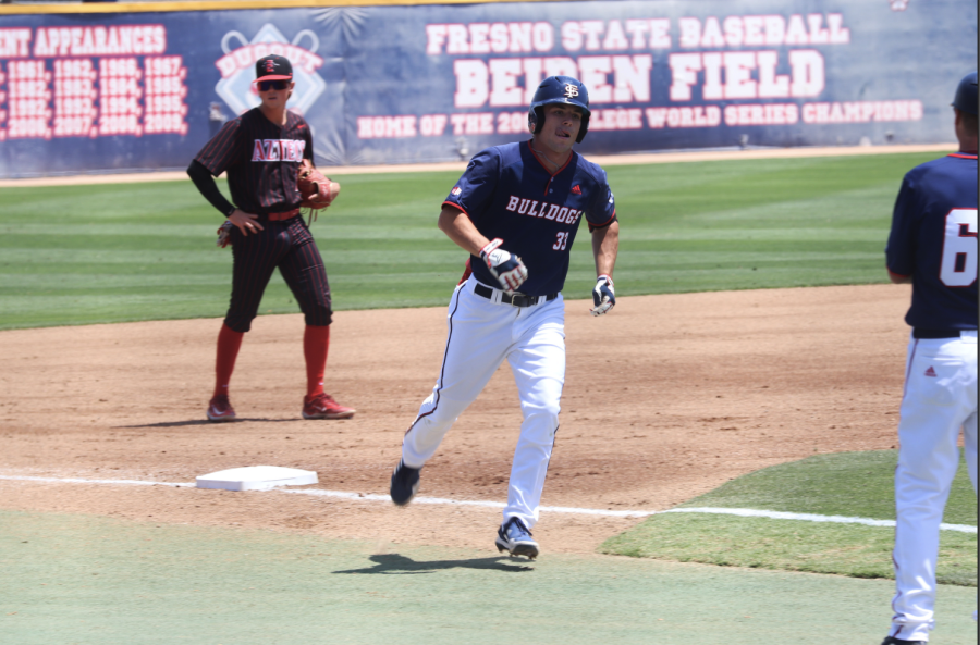 Tommy+Hopfe+heads+toward+home+plate+for+a+run+against+San+Diego+State+at+Pete+Beiden+Field+at+Bob+Bennett+Stadium.+