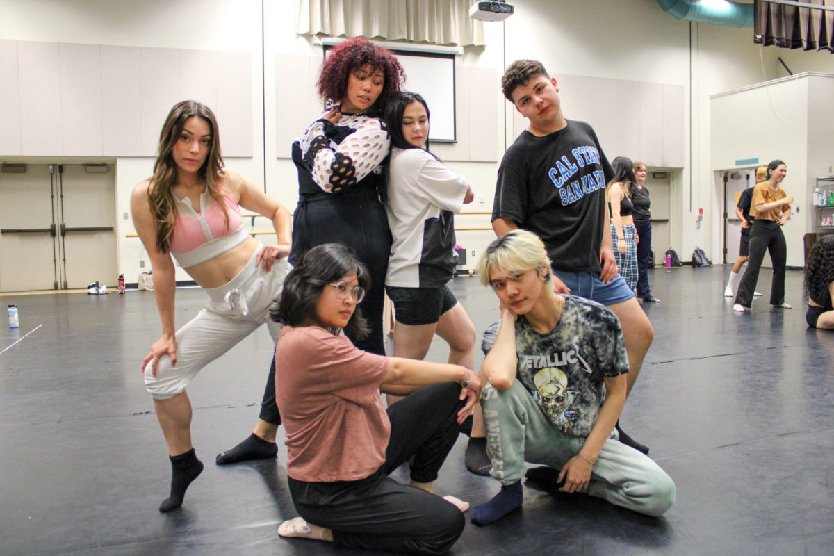 Summer Arts students in the K-pop dance course pose at the end of their dance routine during practice on July 12 in the Music Building.