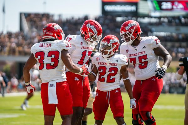 Fresno State players celebrate after a touchdown against Purdue on Sept. 2. 