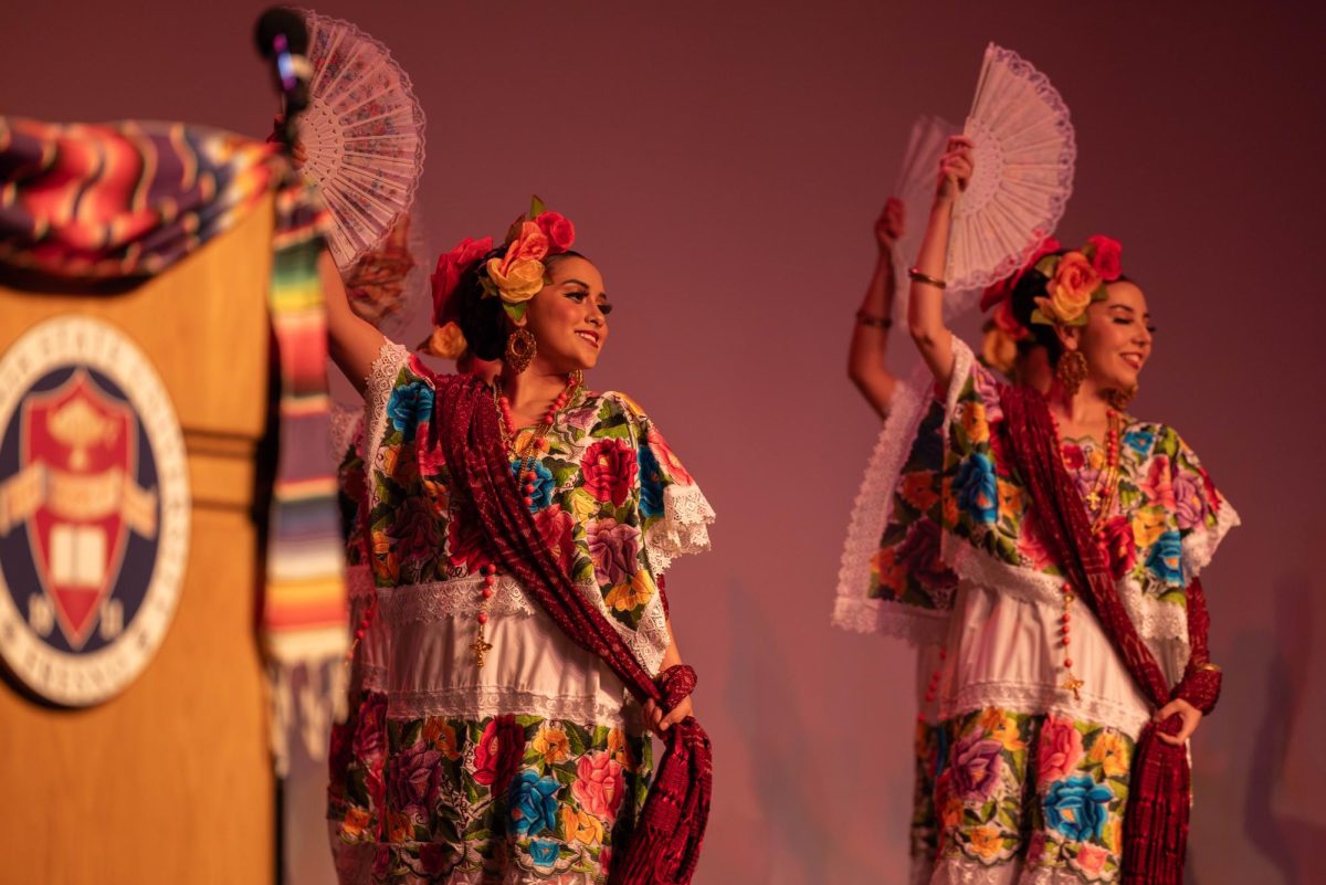 Los Danzantes De Aztlán performing a colorful number of folklórico. (Jacqueline Carrillo/The Collegian)