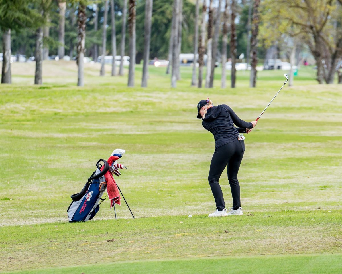 Sophomore Katelyn Lehigh hits the ball at the Leadership and Golf Invitational at the Chambers Bay Golf Course in Washington. 