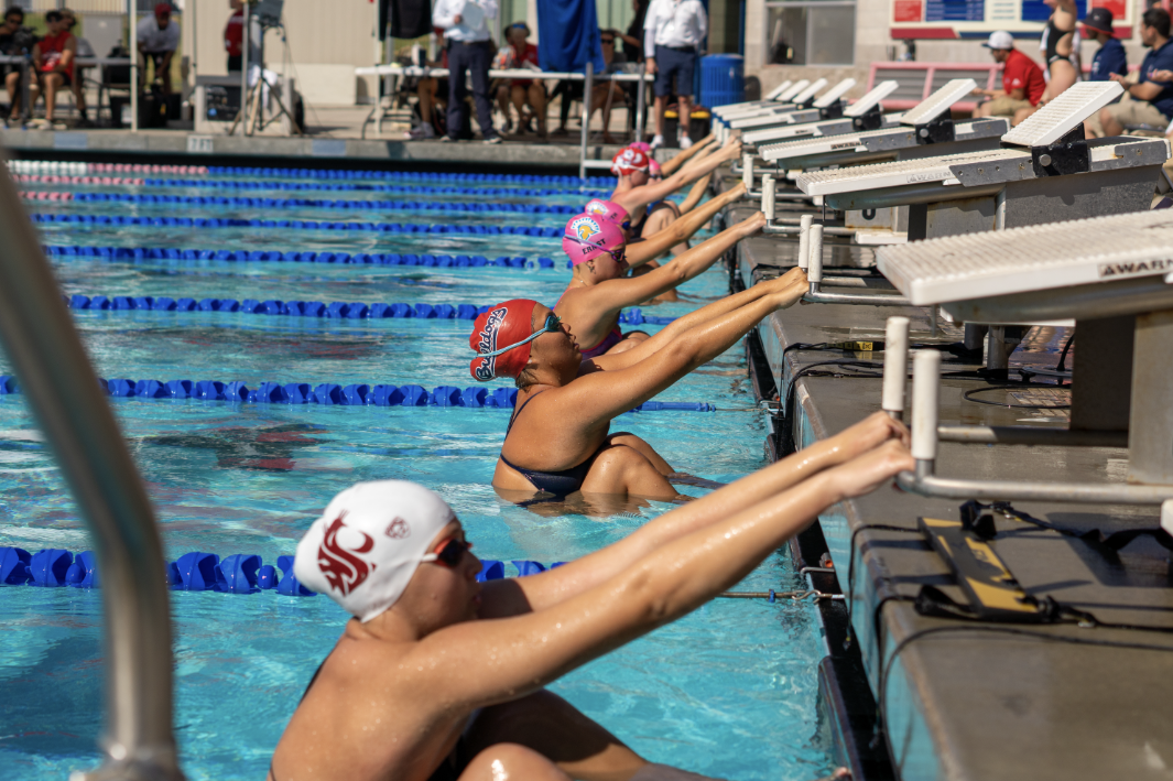 Bulldog Korrie Tengan takes position before swimming in the 200m backstroke at the Fresno State Invitational on.