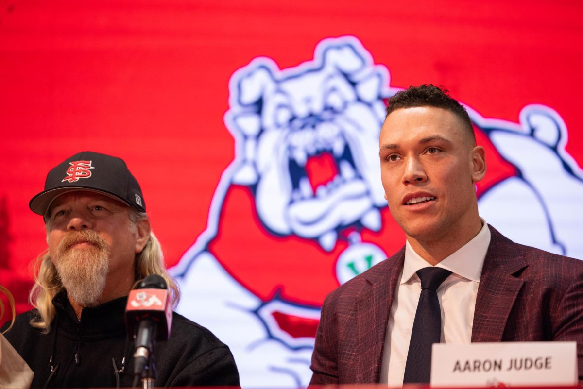 Mike Batesole (left) and Aaron Judge (right) sit during a press conference at Josephine Theater on Nov. 19. 