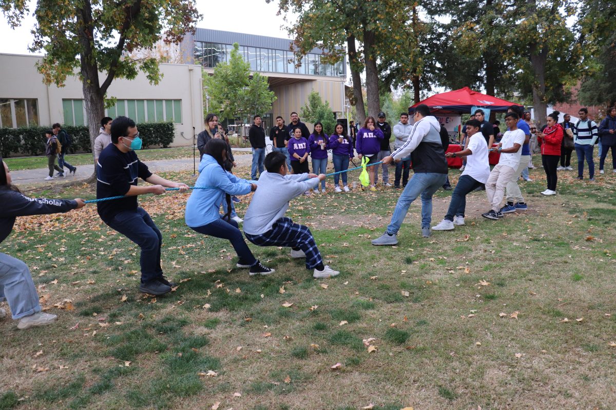 Students+playing+tug-o-war+during+the+third+annual+Culture+Fest.+The+event+took+place+on+Nov.+15+at+Fresno+States+Memorial+Gardens.