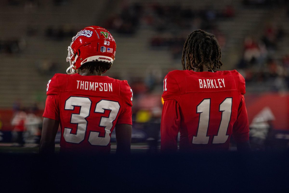 Makei Thompson (left) and Mikel Barkley (right) look at the field during the game against UNLV at Valley Childrens Stadium on Oct. 28. 