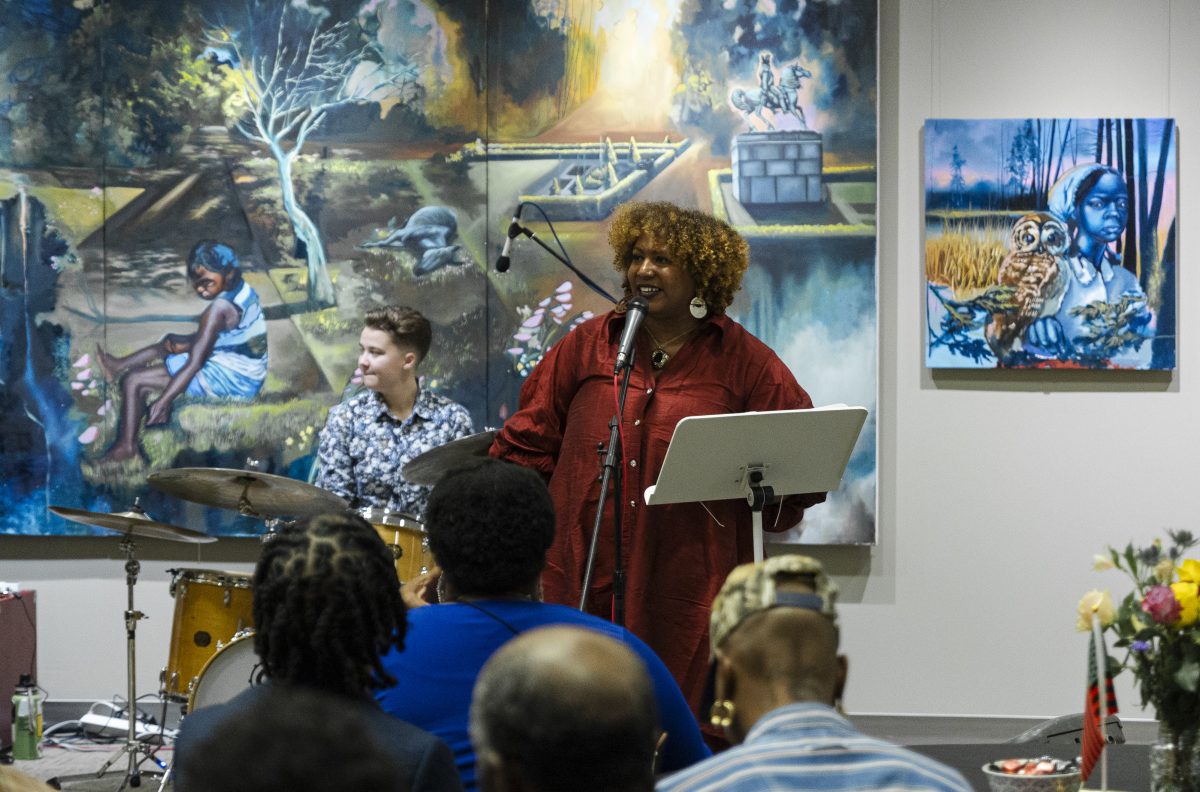 Poet Faylita Hicks performing at the Black Arts Lounge on Thursday, Feb. 22, 2024 in the Leon S. Peters Ellipse Gallery. (Carlos Rene Castro/ The Collegian)