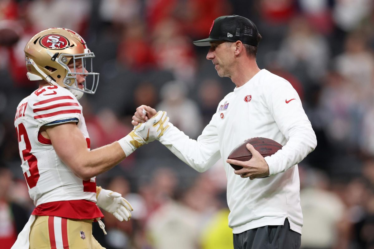 Head coach Kyle Shanahan of the San Francisco 49ers interacts with Christian McCaffrey (23) prior to Super Bowl LVIII against the Kansas City Chiefs at Allegiant Stadium on Sunday, Feb. 11, 2024, in Las Vegas.
