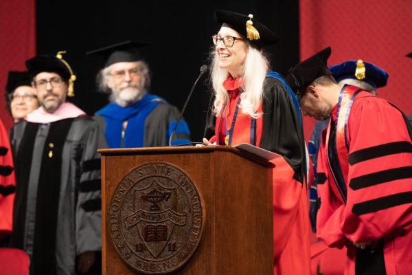 Honora Chapman, dean of the College of Arts and Humanities, speaks at graduation during Spring 2023.