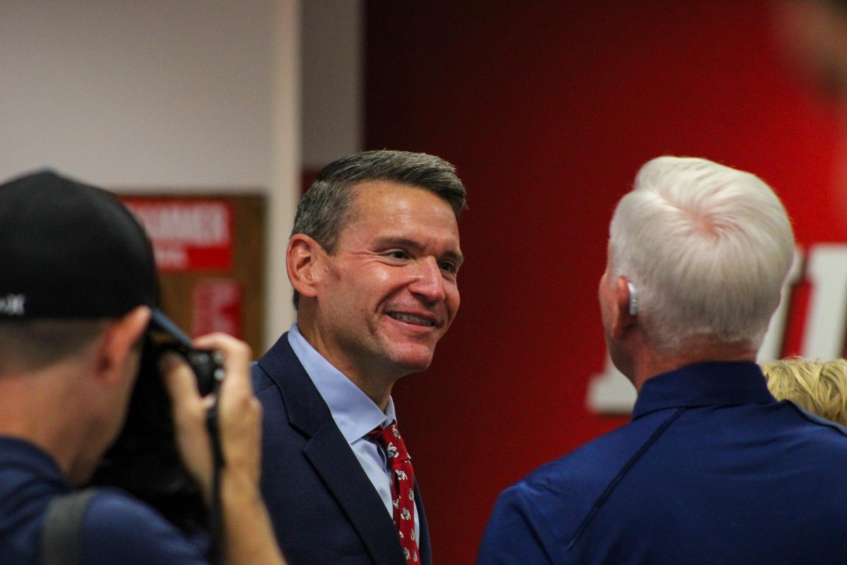 Director of Athletics Garrett Klassy greets family and friends at introductory press conference on June 28.  