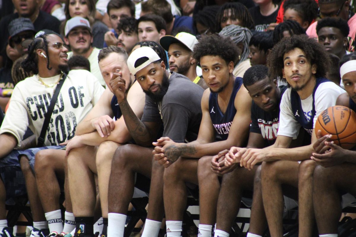 George sits on baseline for Pro-Am Season 3 All-Star game. 