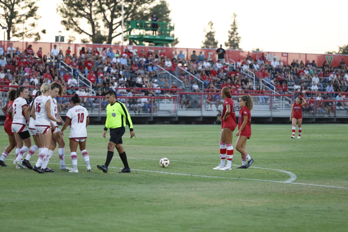 Laura Mas Serra and Ciara Wilson get ready to shoot a free kick.