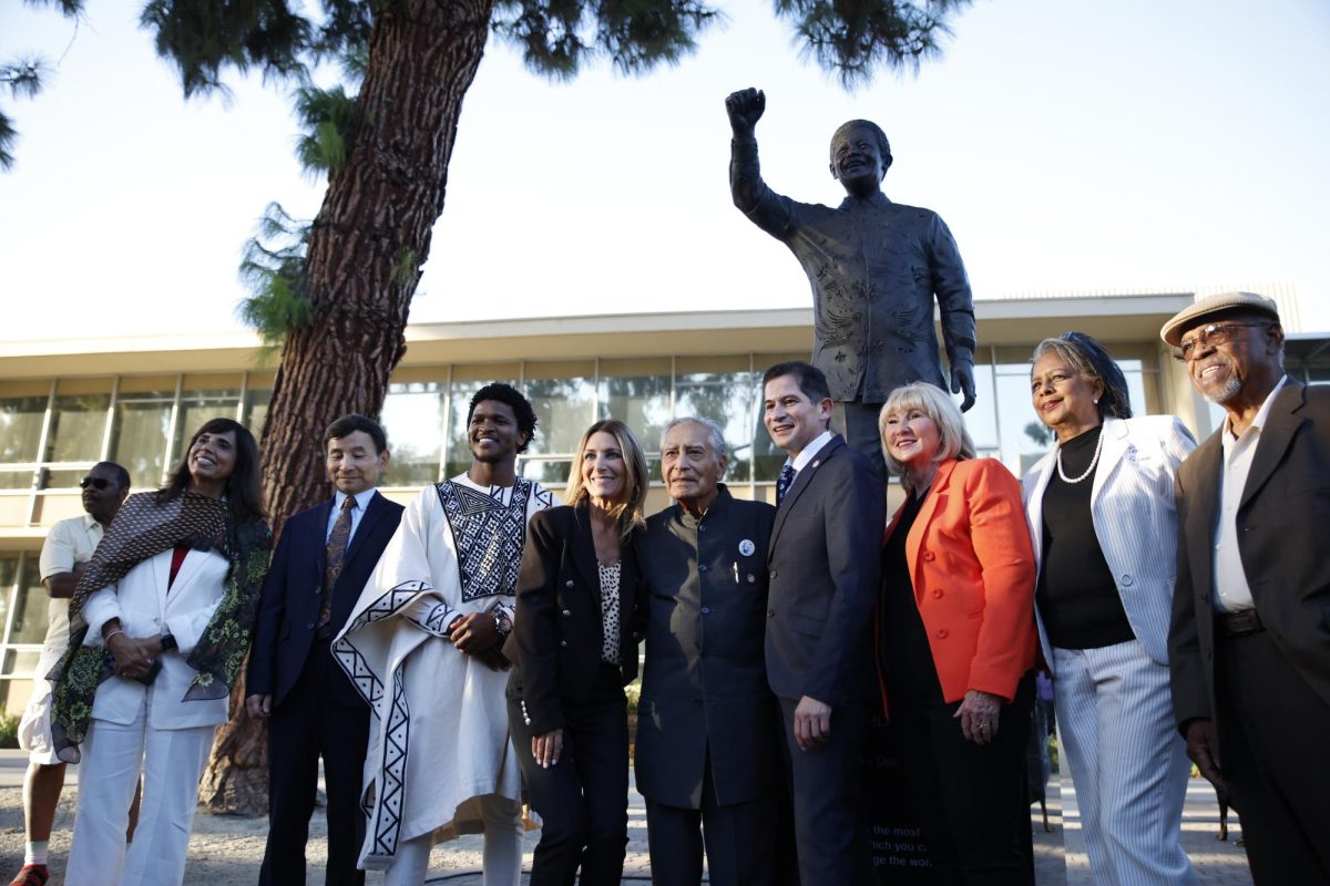 Siyabulela Mandela, President Saúl Jiménez-Sandoval and distinguished guests pose in front of the Nelson Mandela statue in the Peace Garden after the statue unveiling, on Sept. 12.