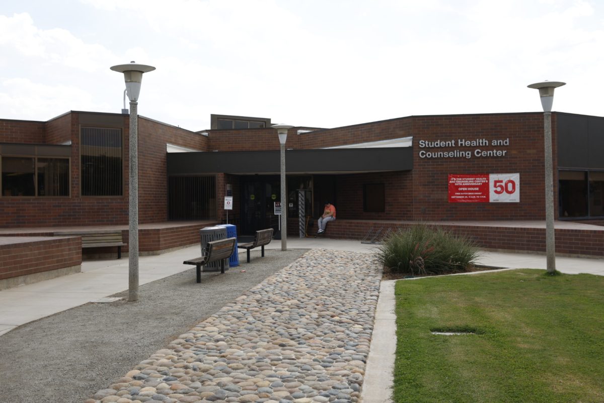 The Student Health and Counseling Center displays 50th anniversary banner inviting the campus community to attend its celebratory tour. 