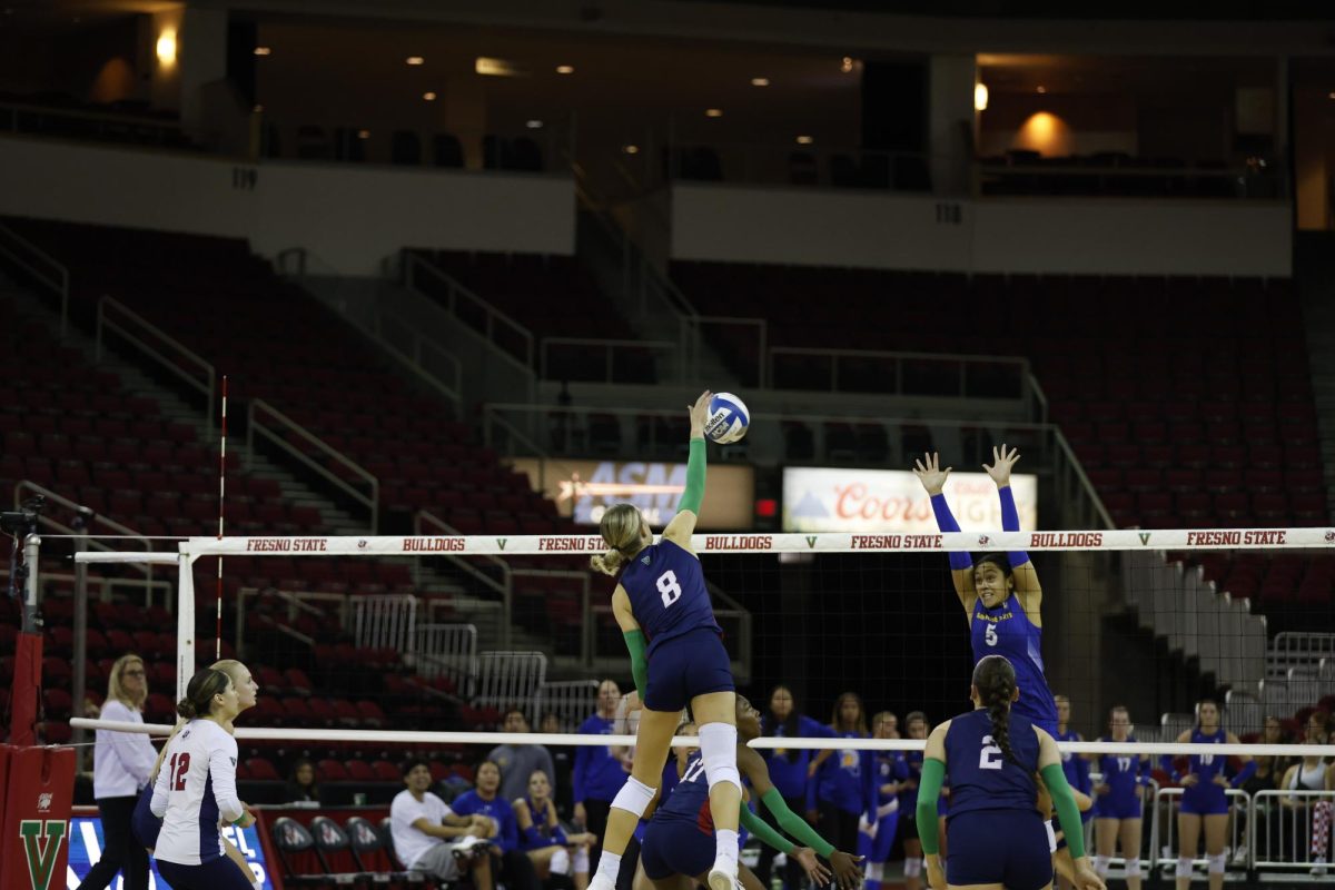 Ella Rud (8) goes in for the kill against San Jose State on September 24, 2024. 