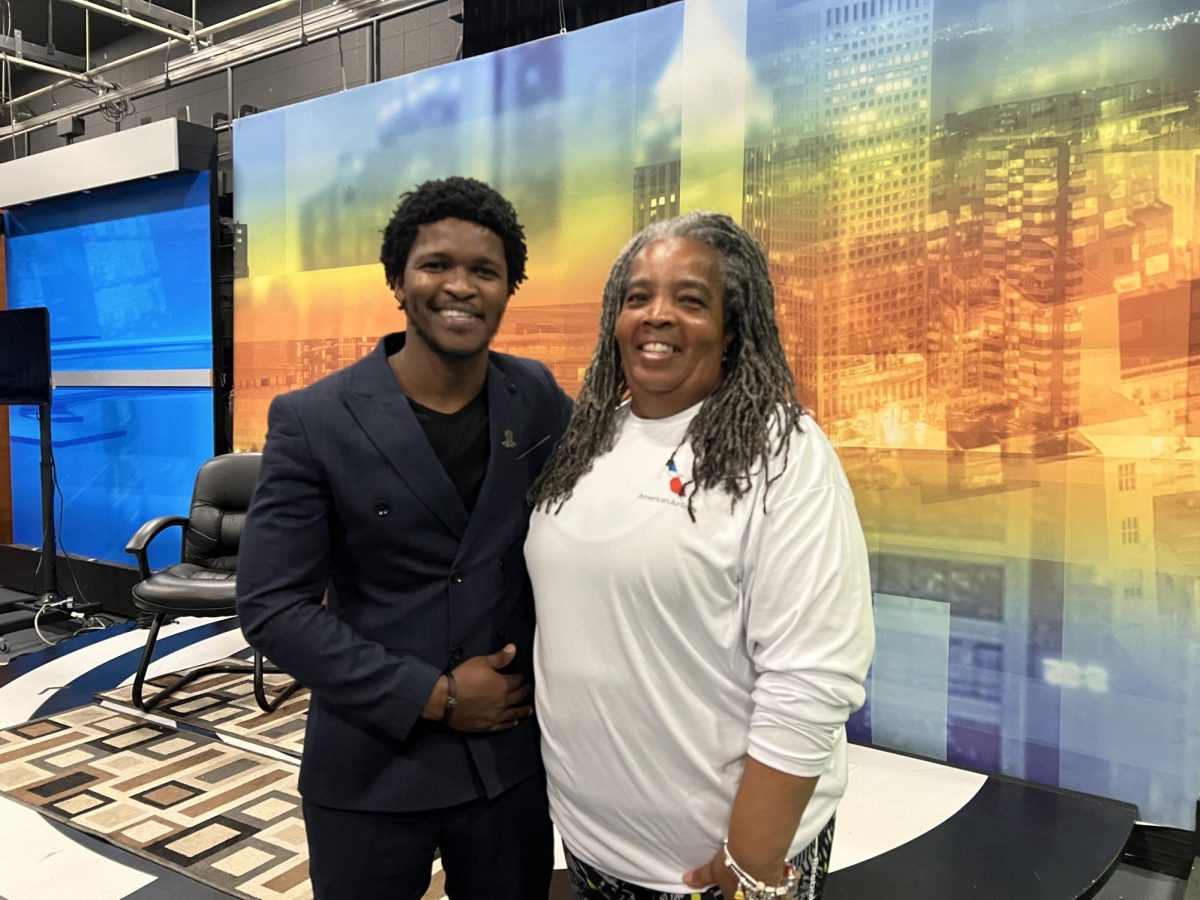 Siyabulela Mandela (left) and Darlene Roe (right) in the TV Studio after Mandela's discussion at Fresno State. 