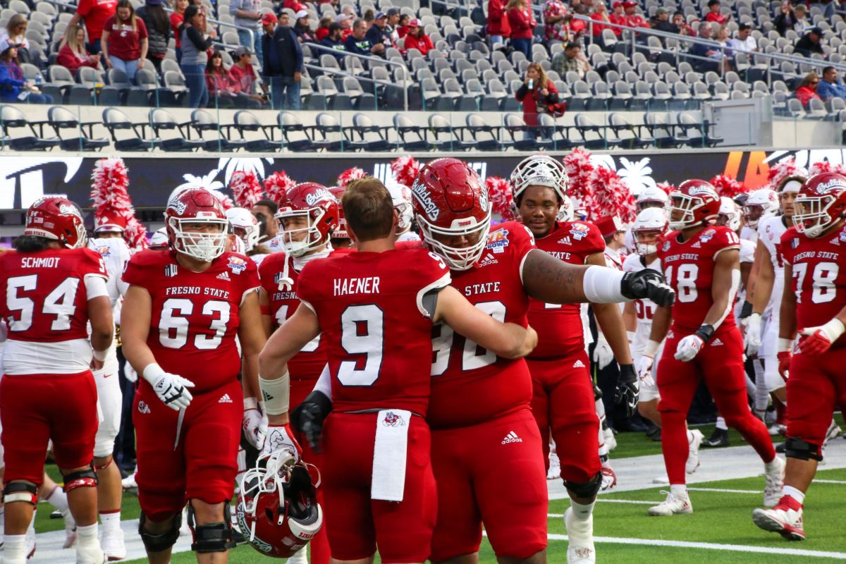 Jake Haener and teammates at the LA Bowl game in 2022 against Washington State. 