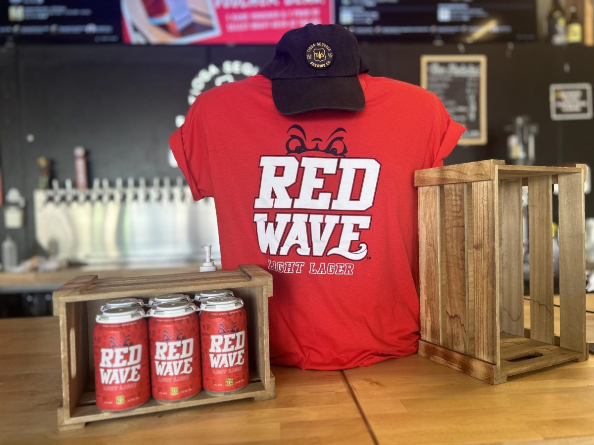 A display of Red Wave beer in wood box next to Red Wave t-shirt at Tioga-Sequoia Brewing Company on Sept. 6. 