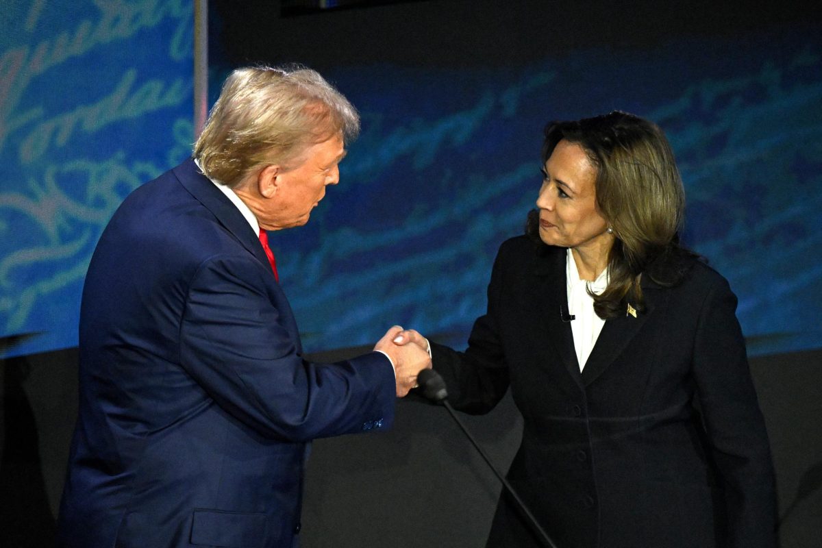 U.S. Vice President and Democratic presidential candidate Kamala Harris shakes hands with former U.S. President and Republican presidential candidate Donald Trump during a presidential debate at the National Constitution Center in Philadelphia, Pennsylvania, on Sept. 10, 2024.