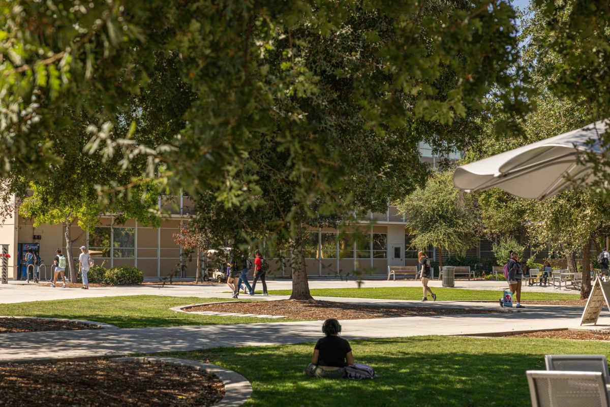 Students hanging out in the quad in between the McKee Fisk building and the Social Science building. This area of campus is where staff and faculty are facing high heat temperatures in the buildings. 