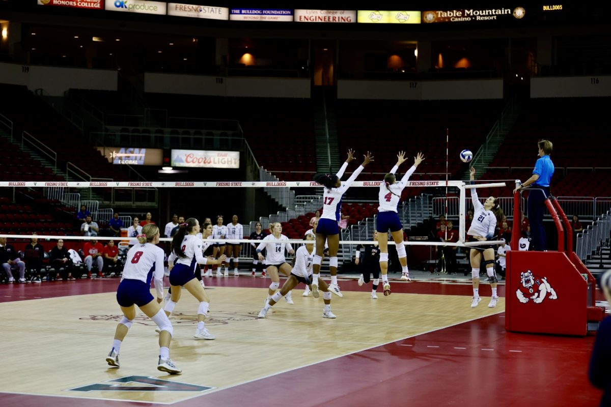 Mya Sellers (17) and Addison Halluska (4) go up for a block against UNLV on October 10, 2024, at the Save Mart Center. 