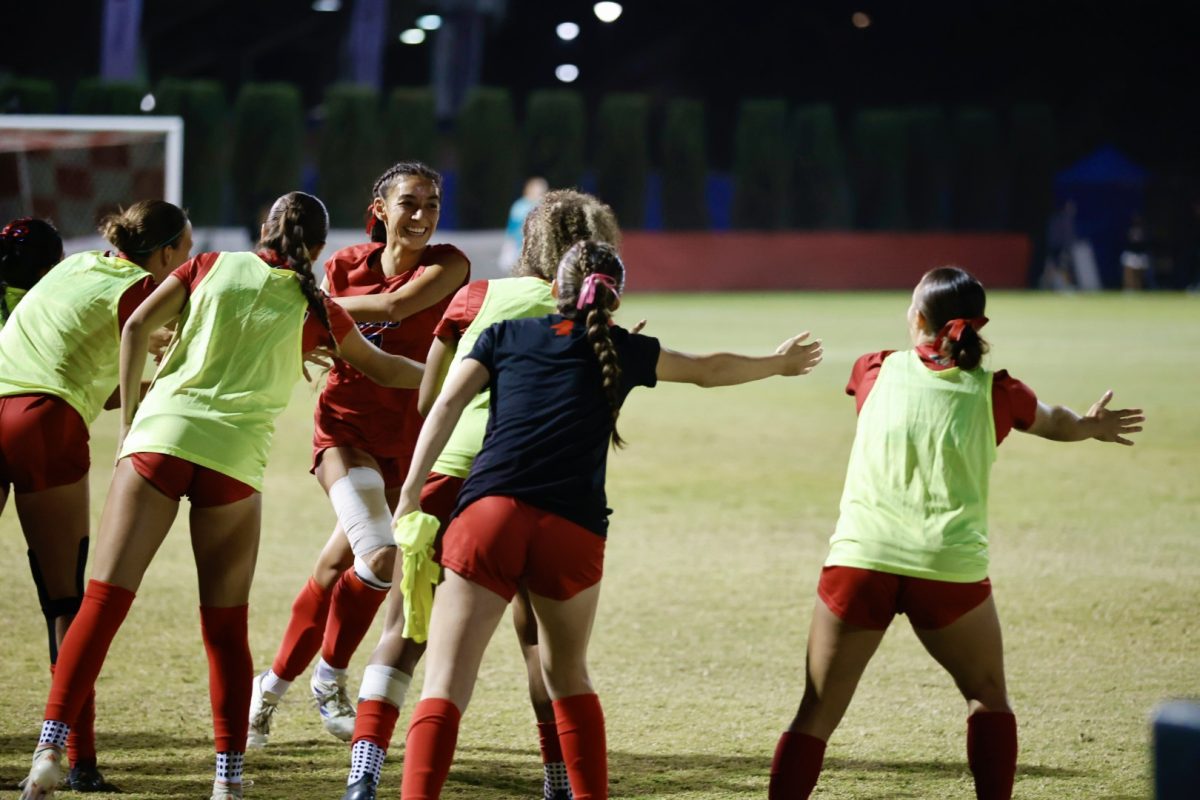 Senior Kaelyn Miller high-fiving teammates after scoring a goal against Air Force on October 25, 2024, at the Bulldog Soccer Stadium. 